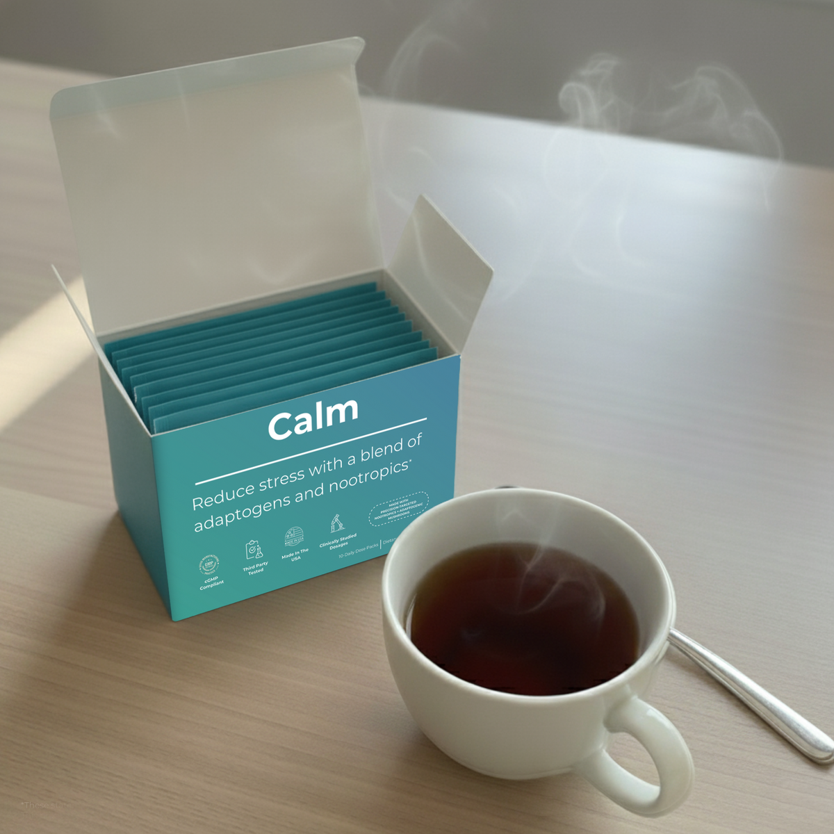 Cup of tea with a box labeled 'Calm' on a table
