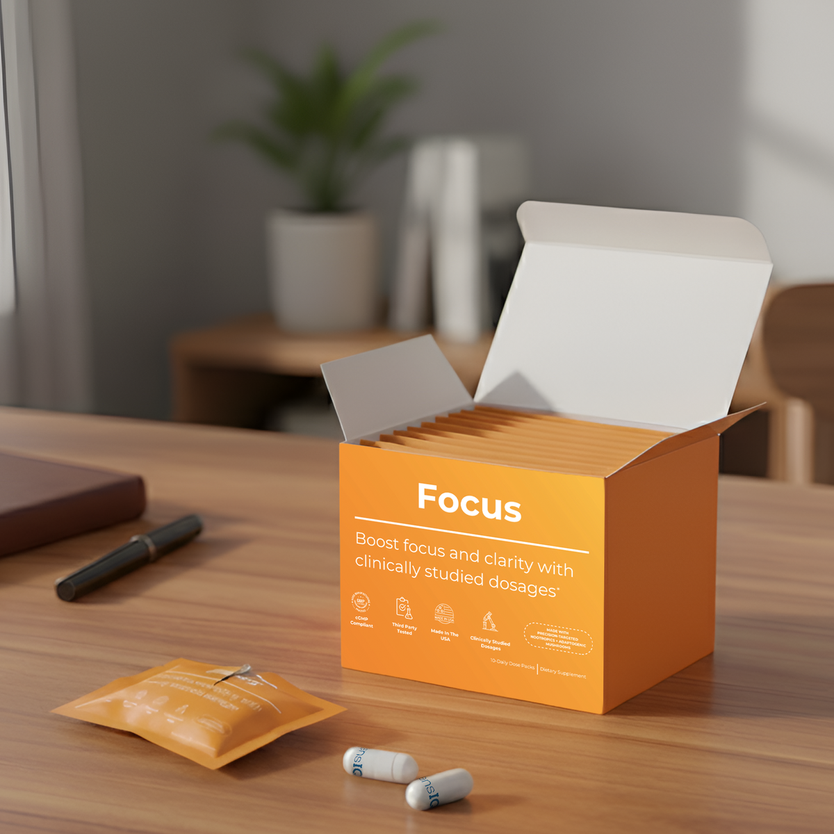 Orange 'Focus' product packaging on a wooden table with a blurred indoor background