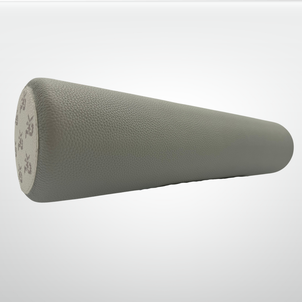 Gray foam roller on a white background