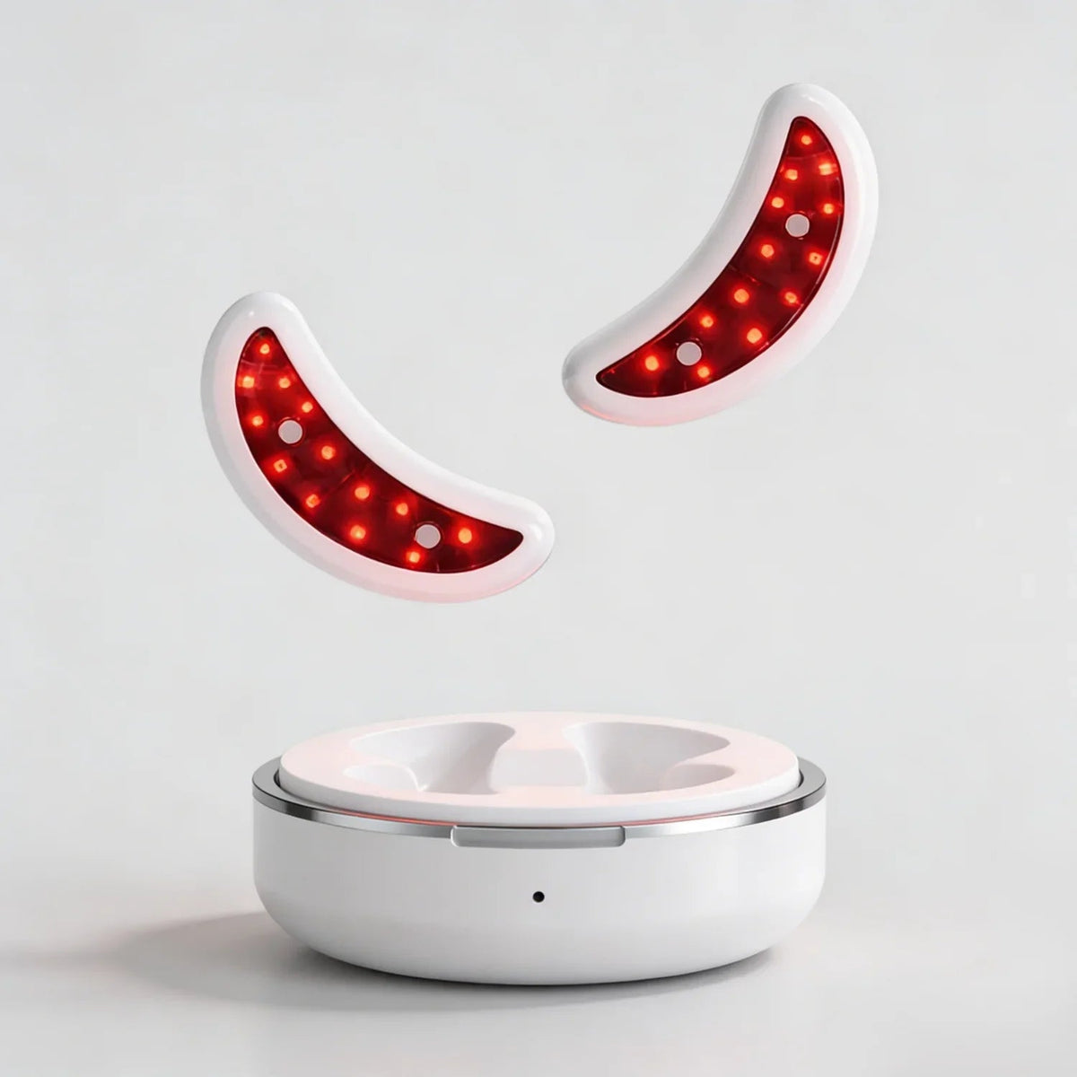 White electronic device with red LED lights on a light gray background