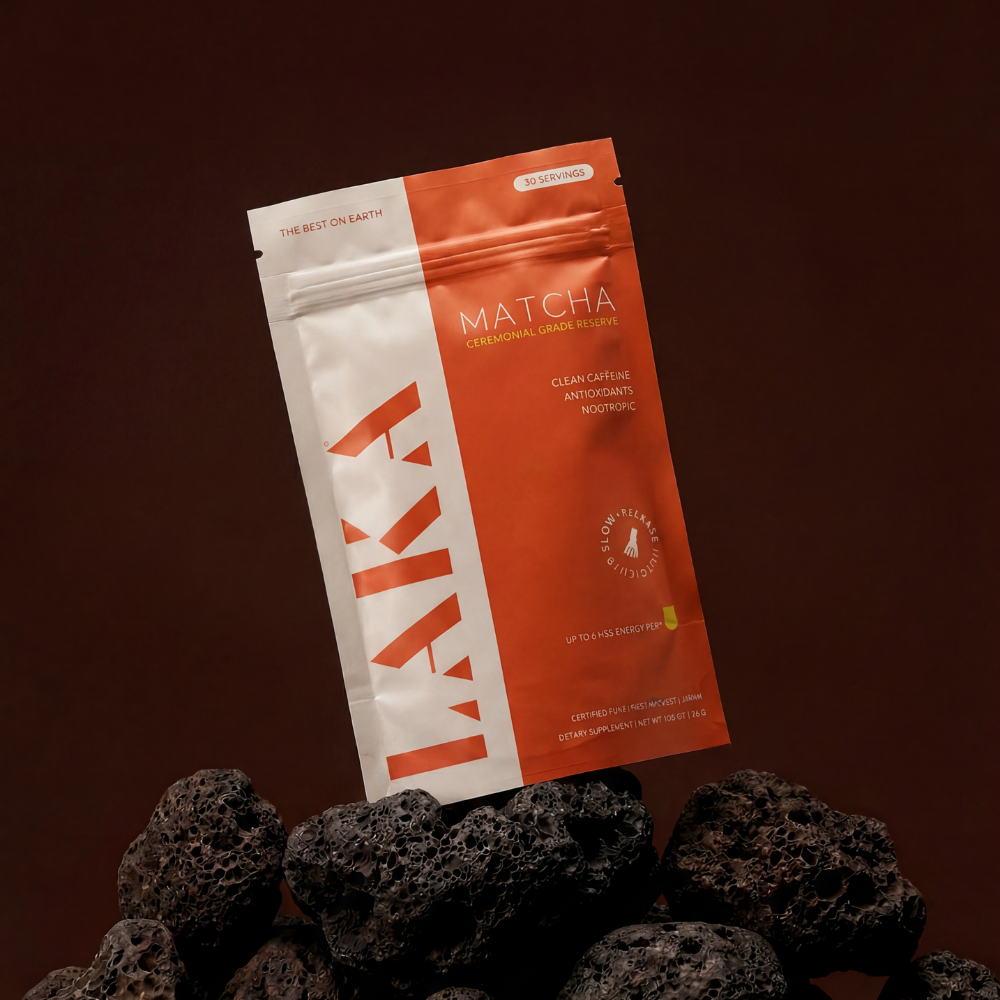 LATA matcha powder package on a dark background with volcanic rocks
