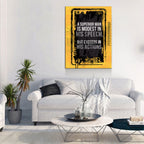 Living room with a motivational quote canvas on the wall above a sofa.