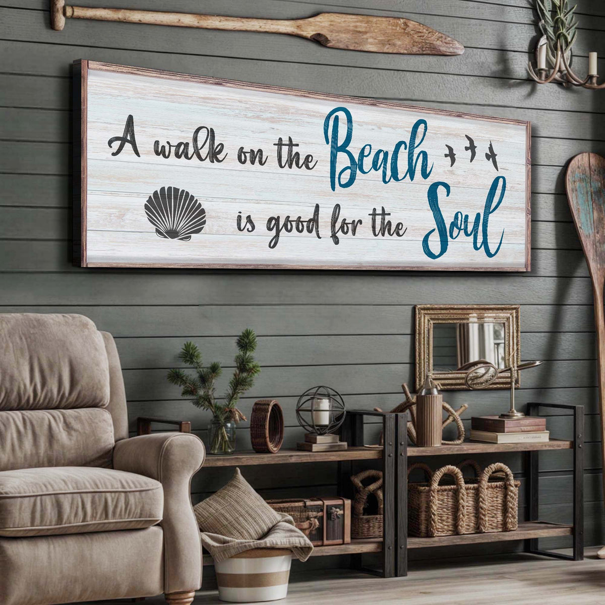 Living room with a decorative sign on the wall, armchair, and wooden shelf.