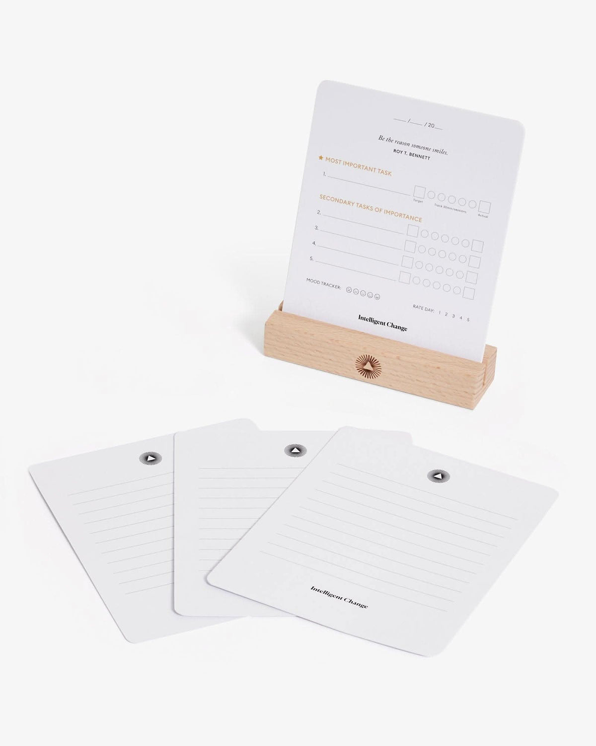 Set of white name cards with silver text on a white background