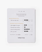 Task management notebook with checkboxes and text on a white background