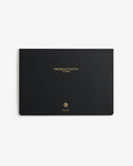 Black planner with 'Productivity Planner' text on a white background