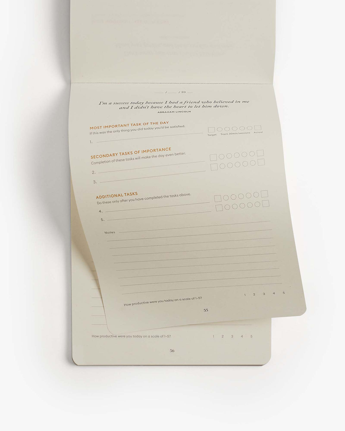 Open planner with task lists on a white background
