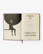 Open book with a silhouette of a person and text on a white background