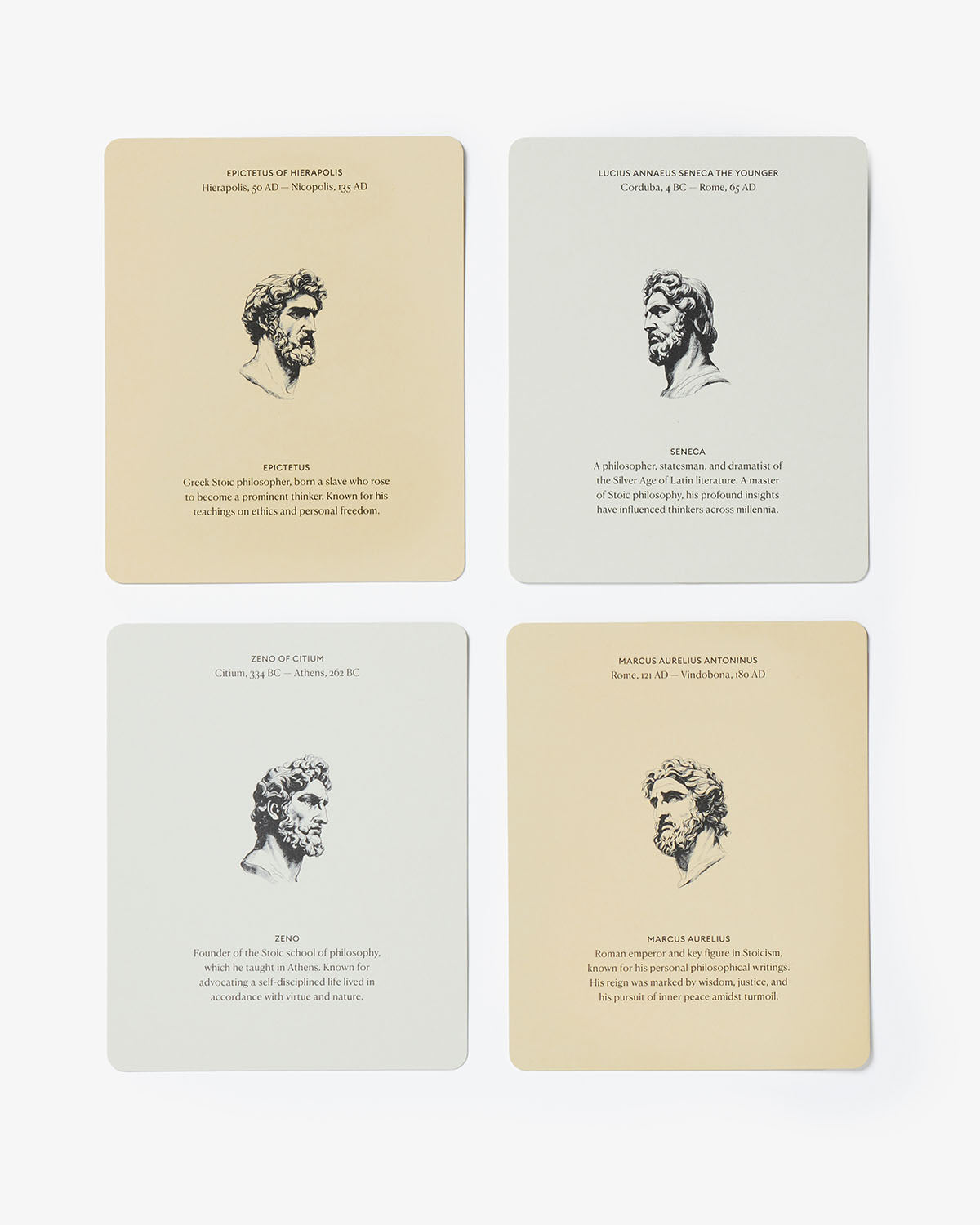 Four cards with classical portraits and text on a white background
