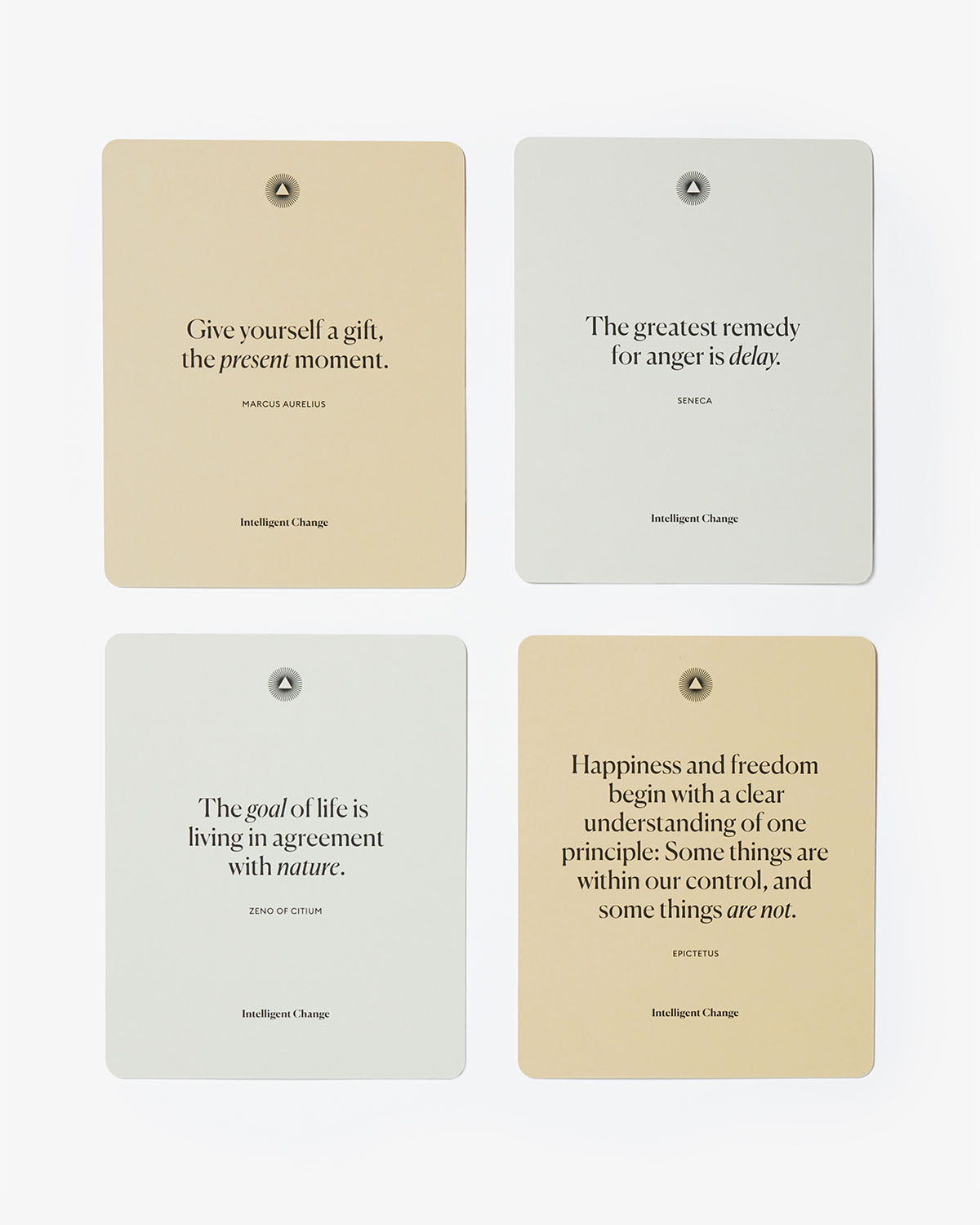 Four motivational cards with quotes on a white background