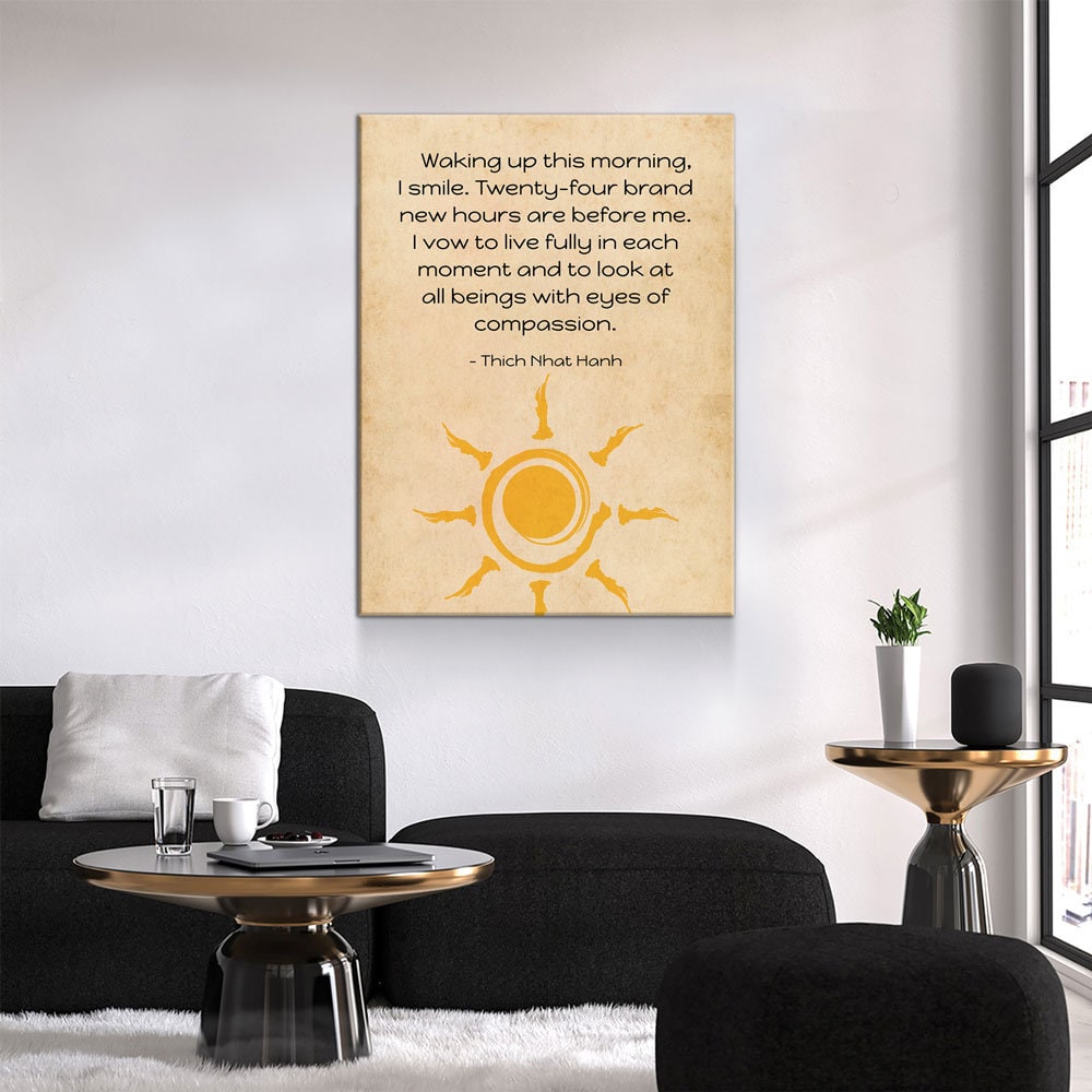 Living room with a motivational quote on a wall, featuring a sun symbol.