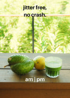 A green juice in a clear glass, a yellow lemon, and a green squash resting on a wooden table with the text 'jitter free, no crash.' and 'am | pm' overlaid on a blurred green garden background.