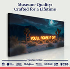 Canvas print of a desert scene with a sign 'You'll Figure It Out' against a mountainous background.