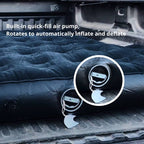 Inflatable mattress with built-in quick-fill air pump on a vehicle floor.