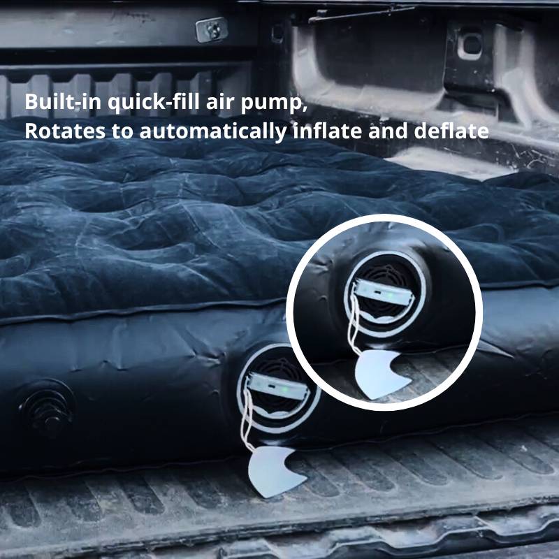 Inflatable mattress with built-in quick-fill air pump on a vehicle floor.
