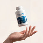 SensIQ Sleep supplement bottle held in a hand against a light background