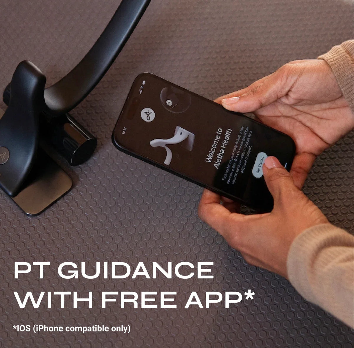 Person using a smartphone with a health app on a textured surface