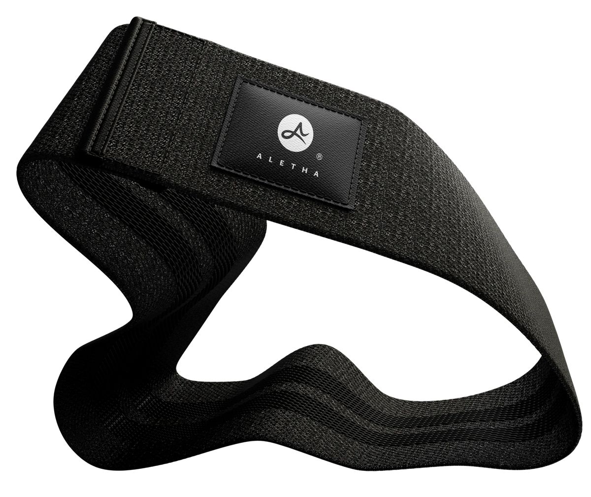 Black headband with a brand logo on a white background