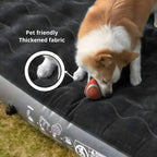 Dog playing with a ball on a thickened fabric pet mat.
