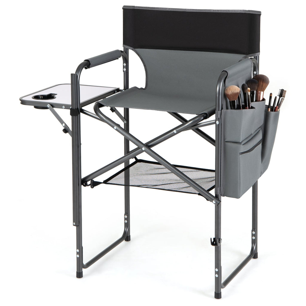 Gray director's chair with a side pocket containing makeup brushes on a white background