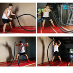 Man using battle ropes in a gym setting