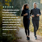 Two runners on a path with a review text overlay about hydration powder.