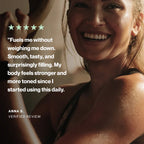 A smiling woman in a black sports bra or tank top appears on the right side of the frame, with a large review quote and five stars overlaid on the left. The text reads: 'Fuels me without weighing me down.