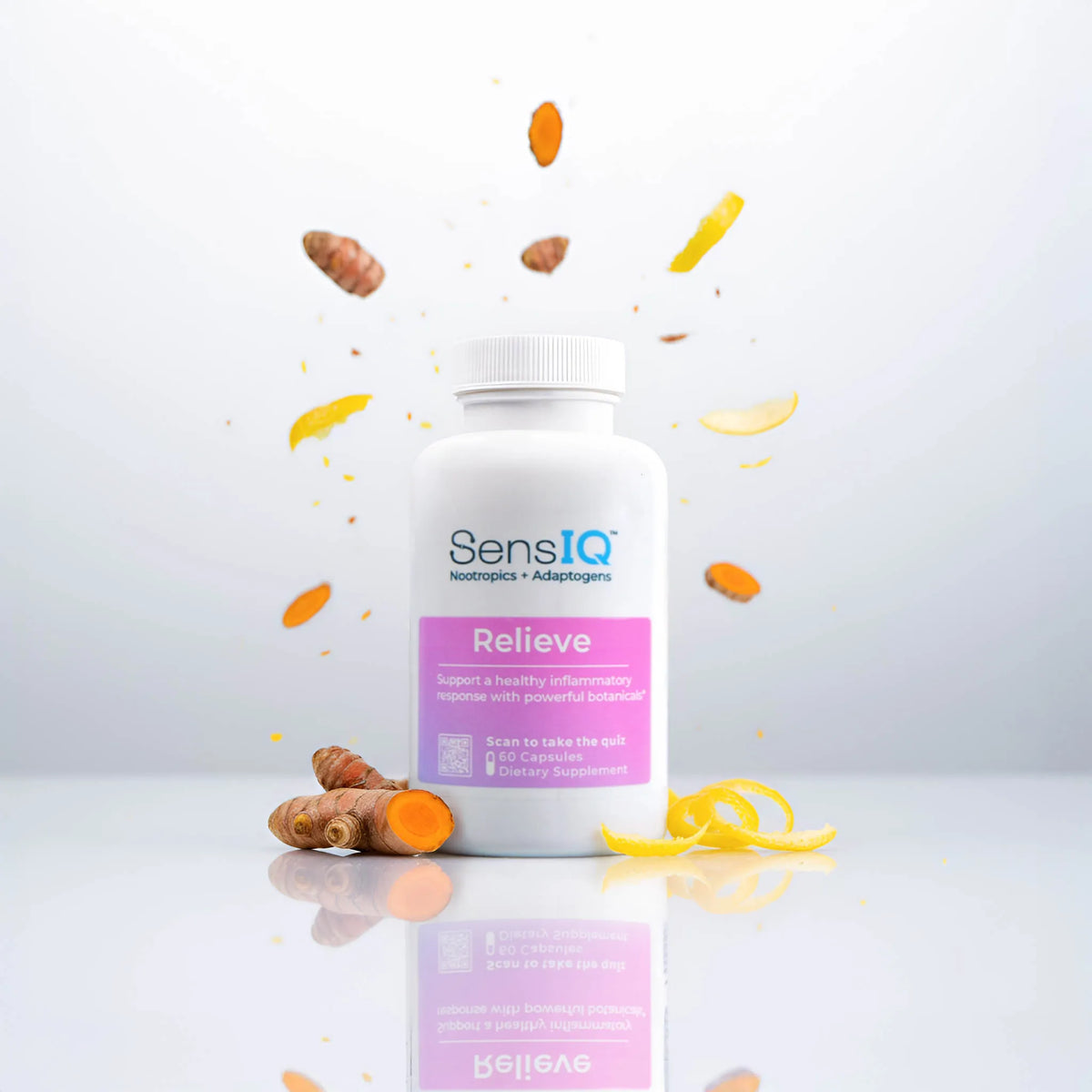 SensIQ Relieve supplement bottle with turmeric and carrots on a light gray background