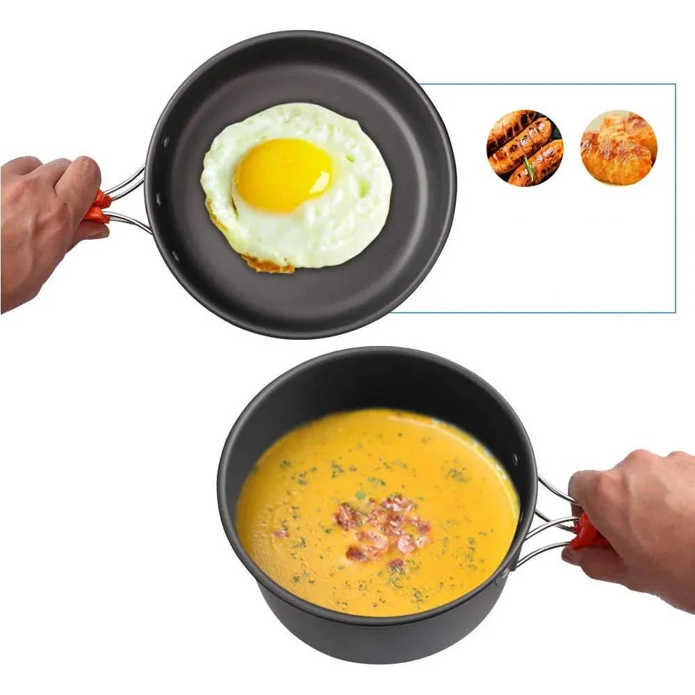 Two frying pans with cooked eggs and a dish, on a white background
