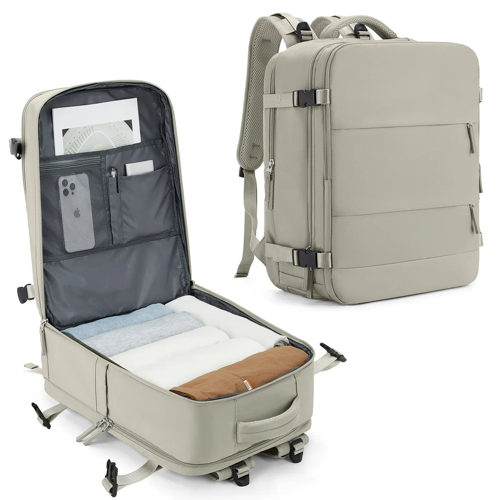 Beige travel backpack with open compartment showing organized items on a white background
