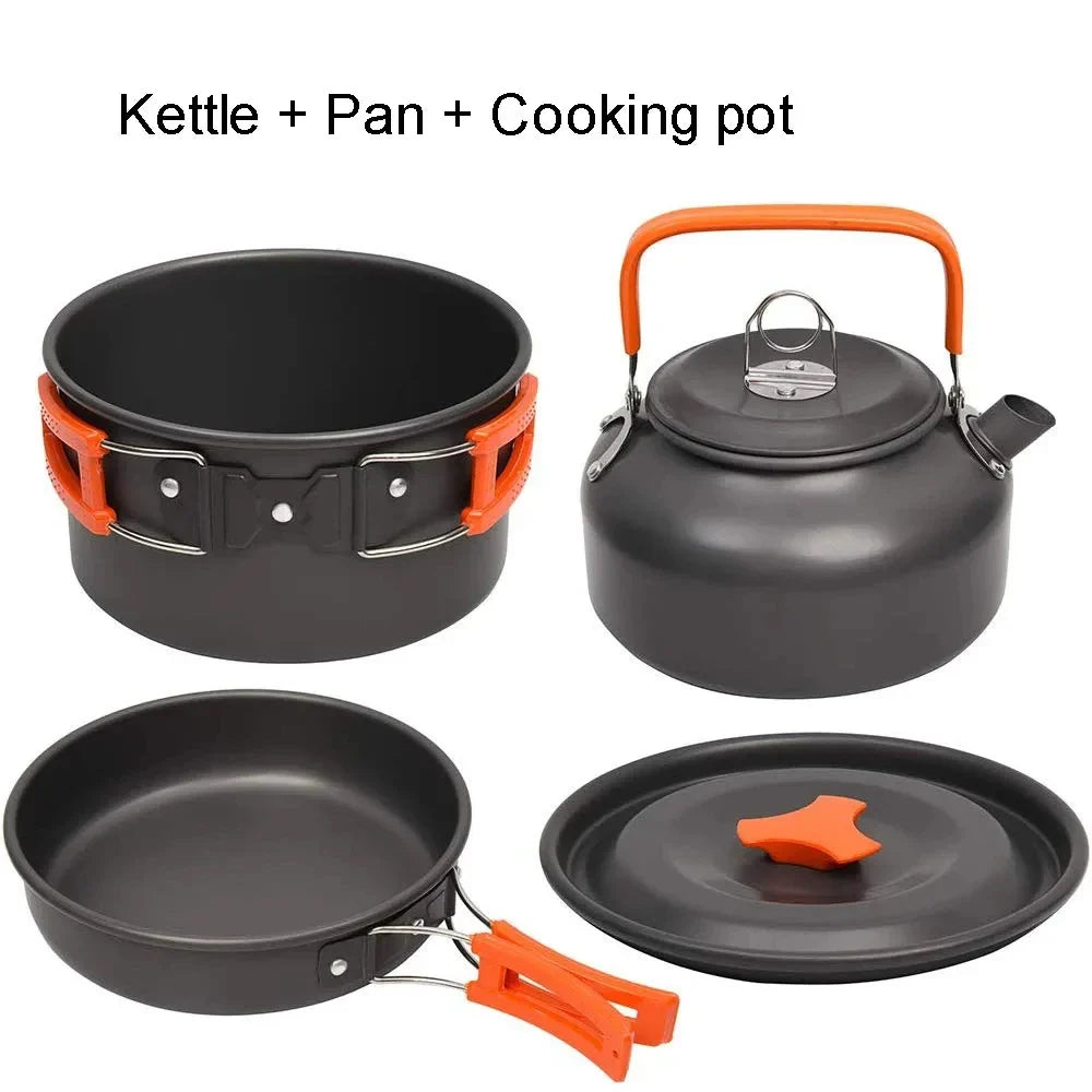 Set of camping cookware including a kettle, pan, and cooking pot with orange handles on a white background.