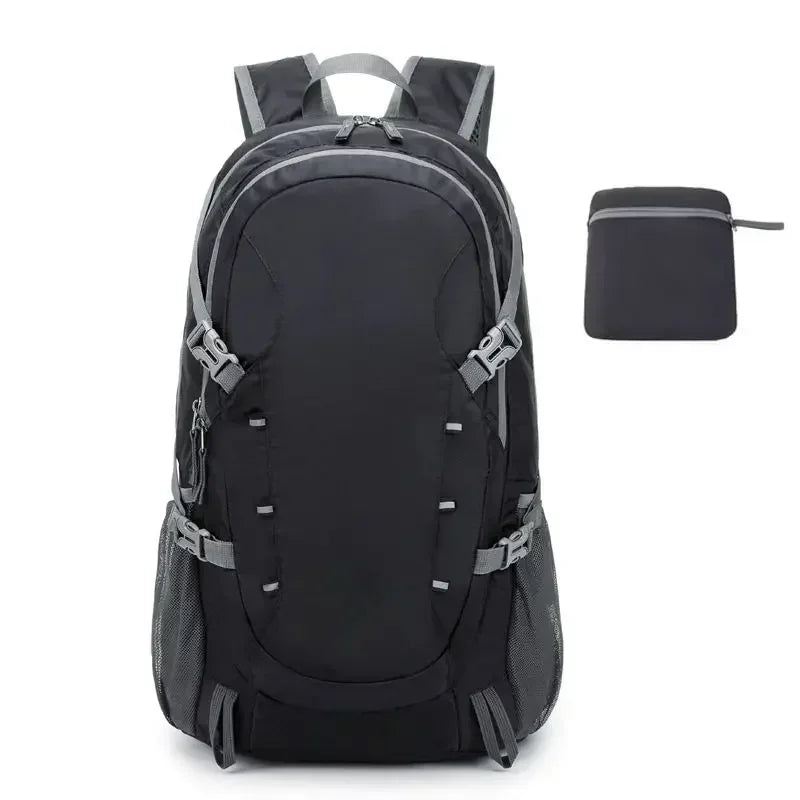 Black backpack with gray accents and a smaller black pouch on a white background