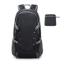 Black backpack with gray accents and a smaller black pouch on a white background