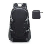 Black backpack with gray accents and a smaller black pouch on a white background