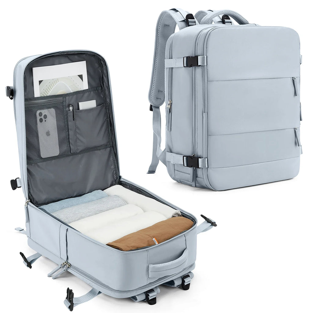Light blue backpack with open compartment showing organized items on a white background