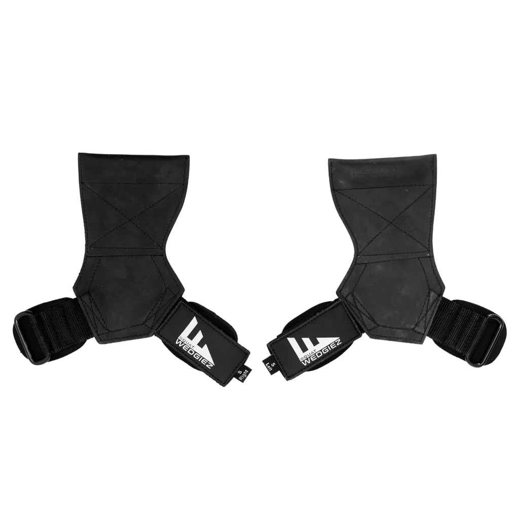 A pair of black protective shin guards with adjustable black straps and white 'LA WOODMITE' branding, displayed against a solid white background.