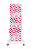 White radiator with colorful polka dot pattern on a white background