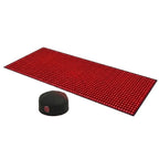 Red mat with black cap on a white background