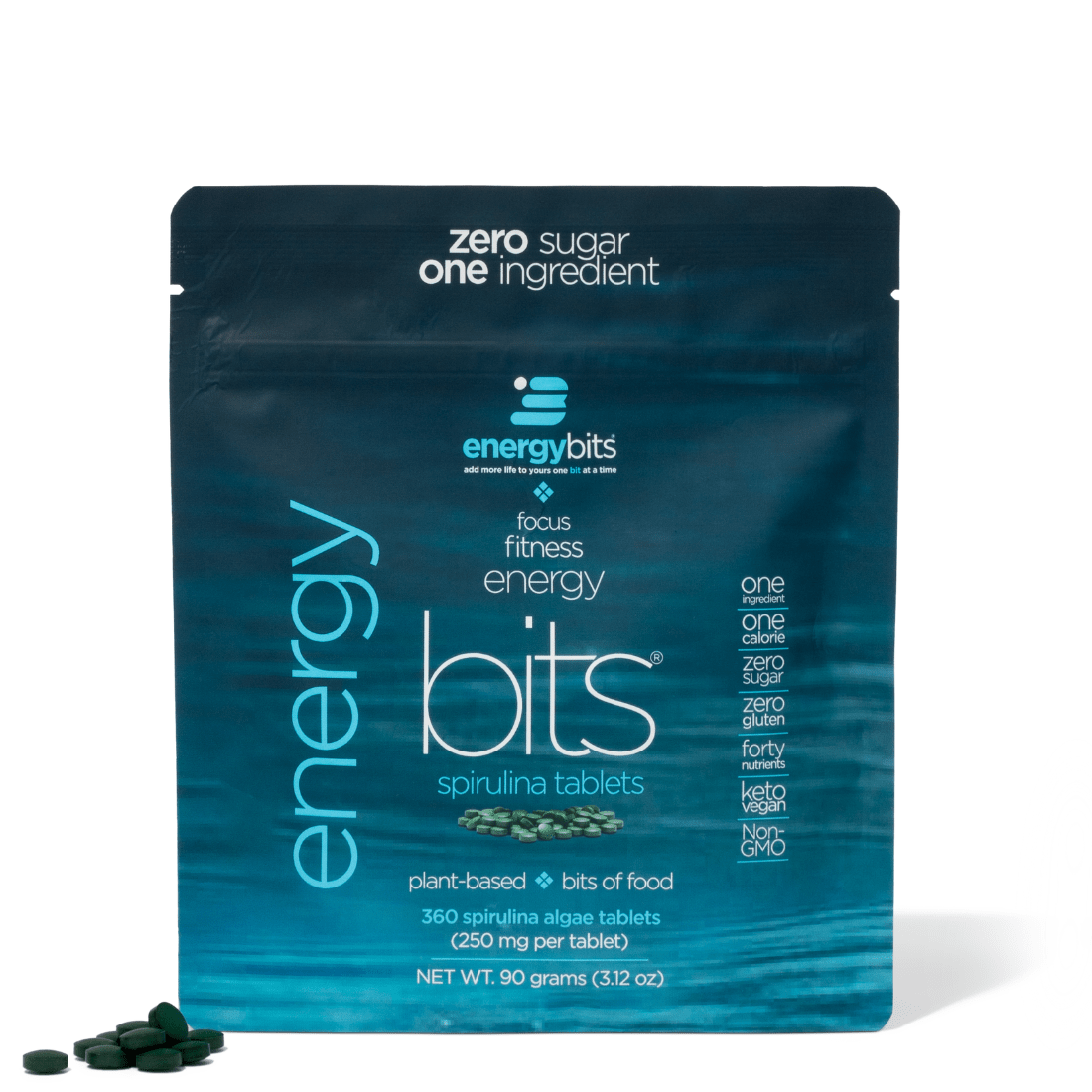 Blue package of energy bits spirulina tablets on a white background