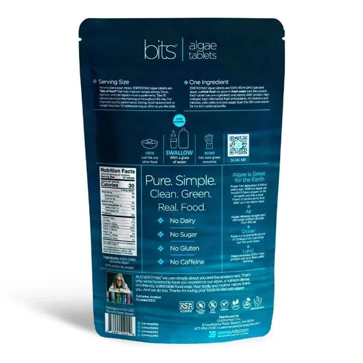 Back view of a dark blue stand-up pouch package for bits algae tablets, showing product information, nutrition facts, icons, and text on a white background.