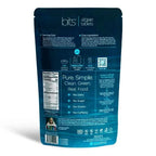Back view of a dark blue stand-up pouch package for bits algae tablets, showing product information, nutrition facts, icons, and text on a white background.