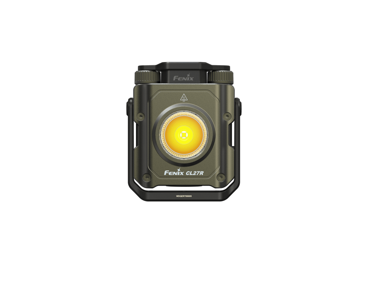 A Fenix CL2TR tactical LED light in olive drab green and black, featuring a glowing yellow illuminated lens, shown on a plain white background.