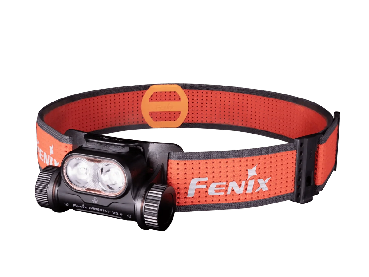 Fenix headlamp with an orange and black adjustable headband, featuring the Fenix logo on the side, shown against a solid white background.