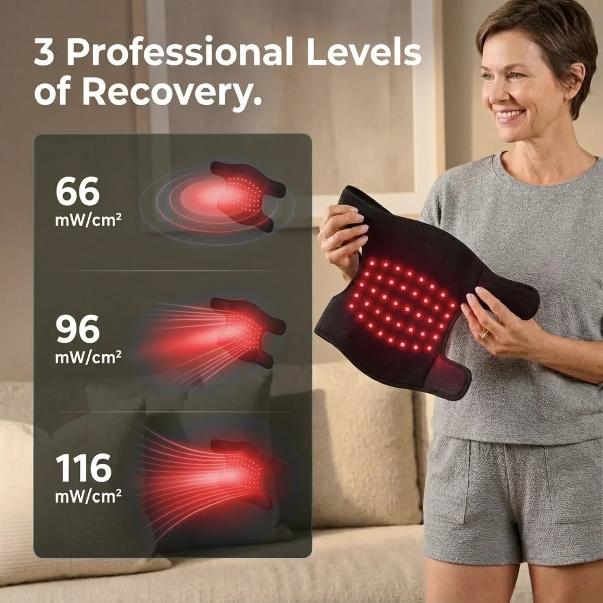 Woman holding a red light therapy device with power levels displayed on a screen.