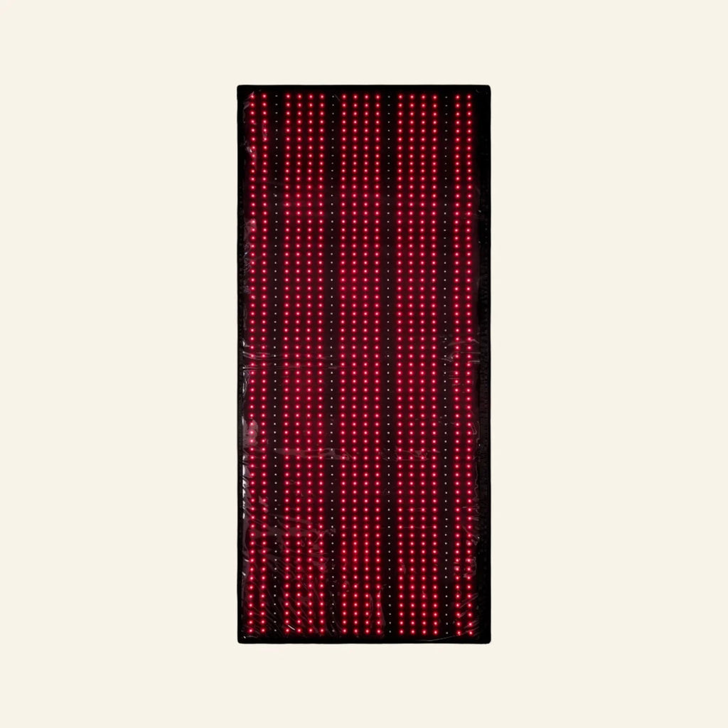 A rectangular black LED light bar or sign with multiple vertical rows of glowing red and pink dots, centered on a light cream background.