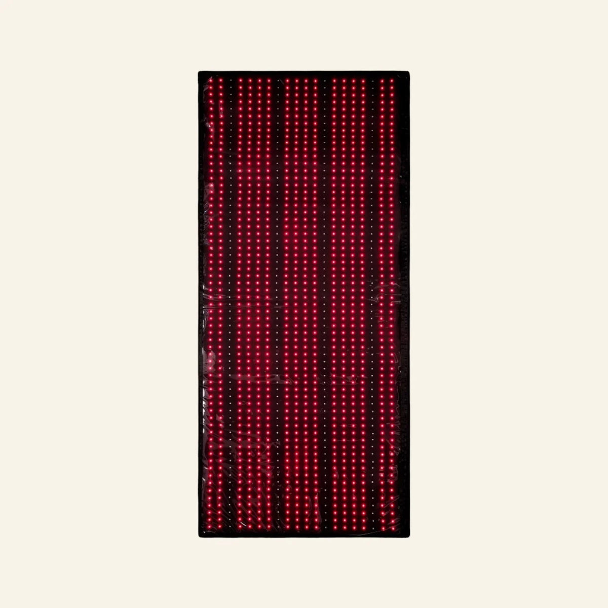 A rectangular black LED light bar or sign with multiple vertical rows of glowing red and pink dots, centered on a light cream background.