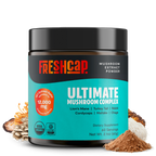 Supplement jar labeled 'Freshcap Ultimate Mushroom Complex' with mushroom powder and slices on a white background